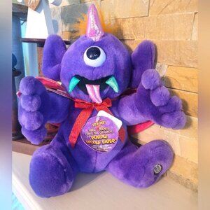 Vintage stuffed one eye one horn flying purple people eater